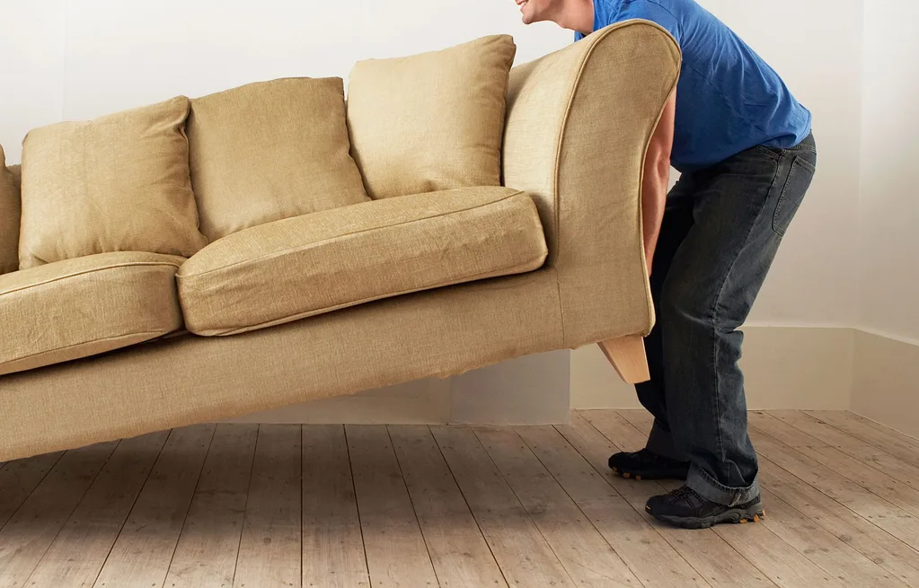 Moving a couch.