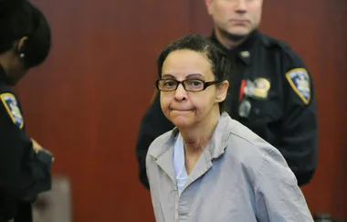 Nanny accused of stabbing two children to death in apartment