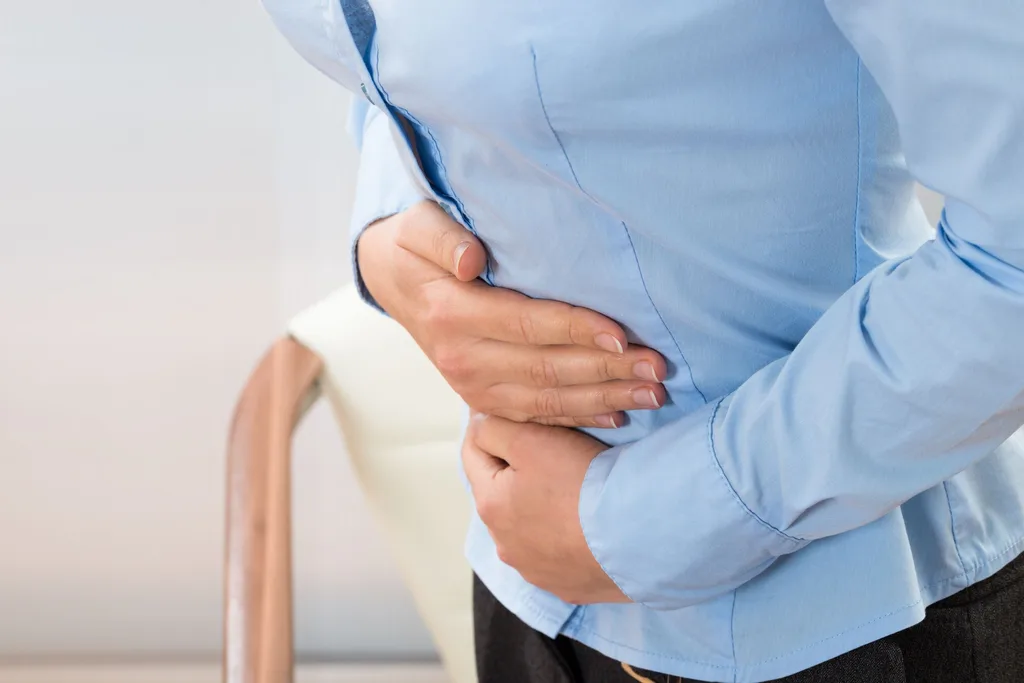 Office worker with stomach pain.