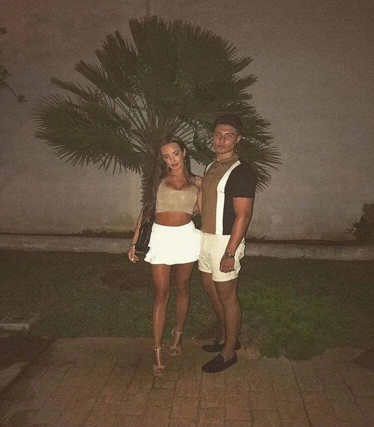 What is she carrying?