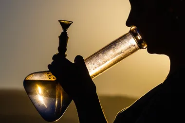Woman charged after 11yo smoked bong in shocking video