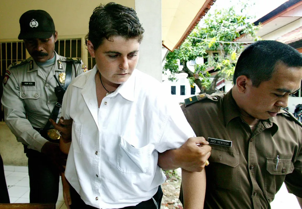 Renae Lawrence is led to her sentencing.