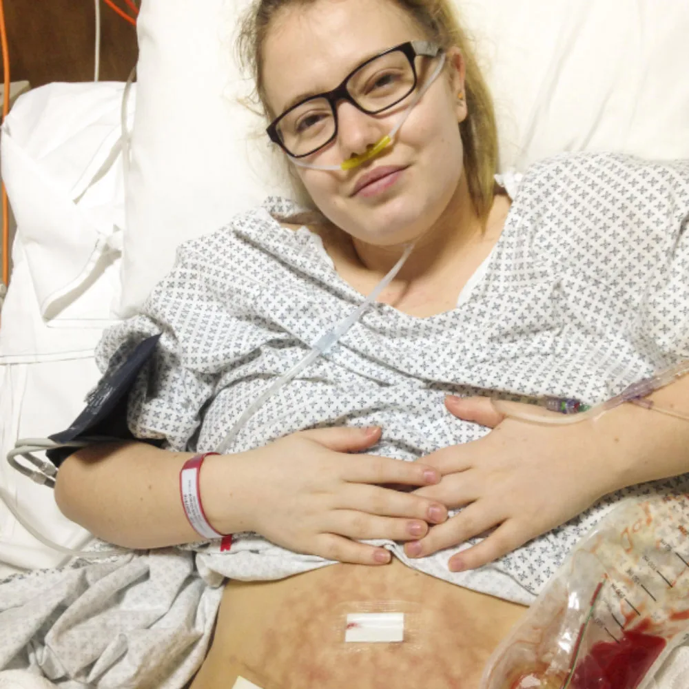 Grace Corcoran in hospital being treated for endometriosis pain