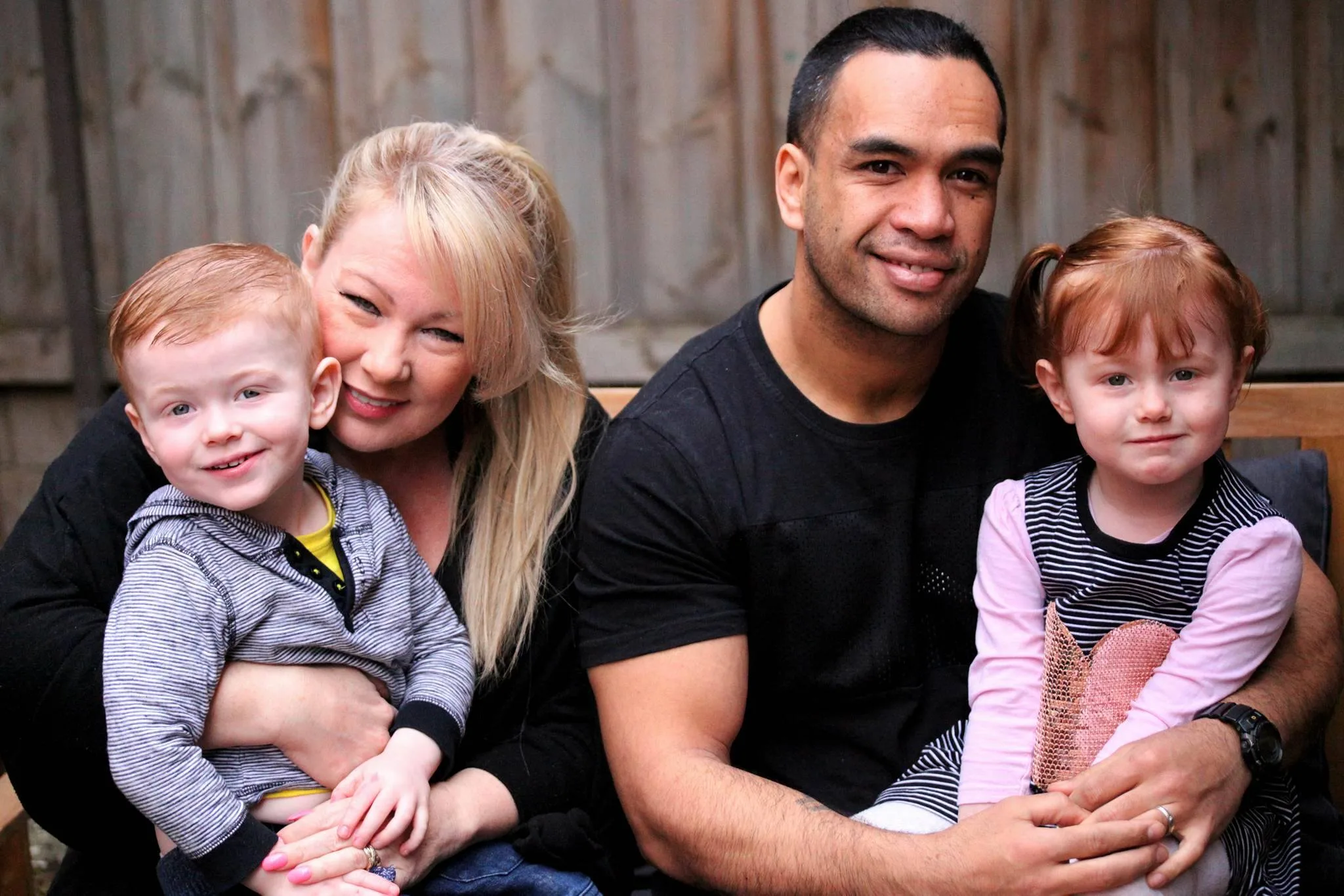 Xan holding Austin, Glen holding Mackenzie grandchildren