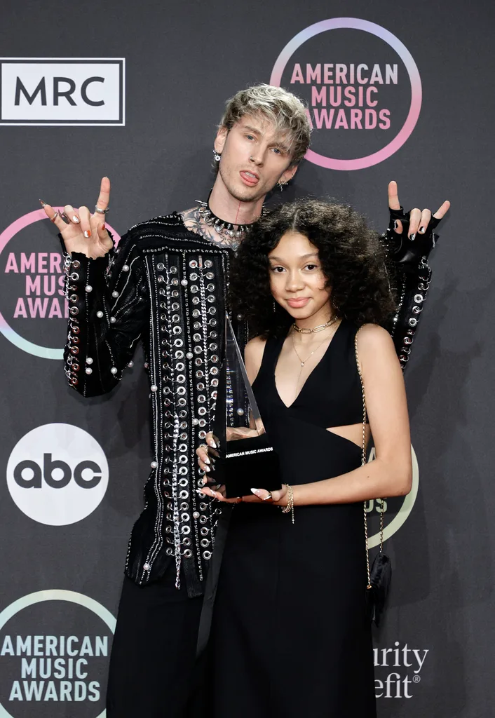 Machine Gun Kelly, winner of the Favourite Rock Artist award, poses with Casie Colson Baker in the Press Room at the 2021 American Music Awards at Microsoft Theater on November 21, 2021 in Los Angeles, California.