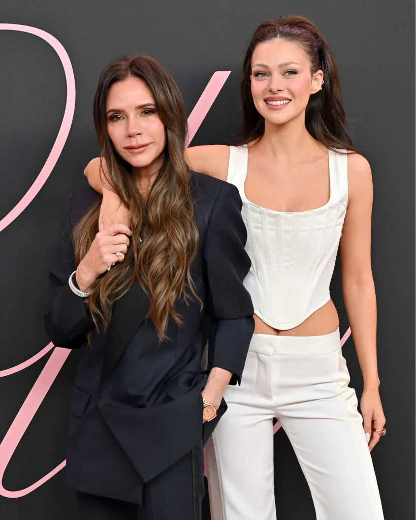 nicola peltz has her arm around victoria beckham at the premiere of the film lola