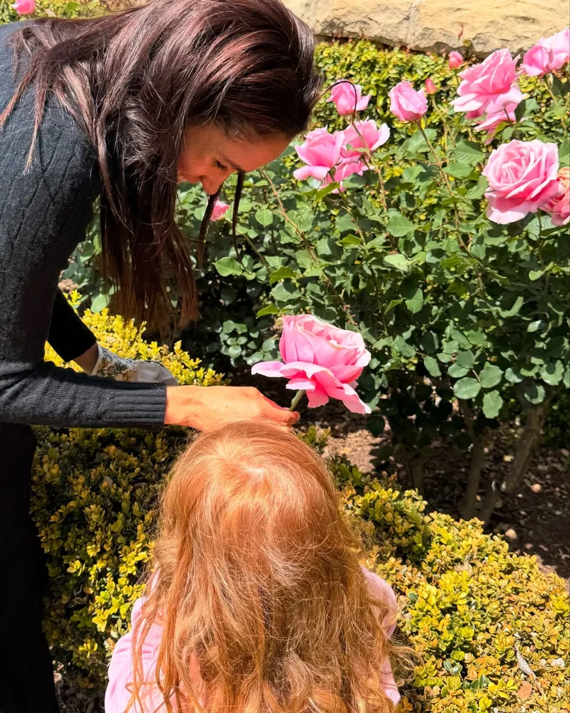 Meghan Markle and Lilibet Sussex in the garden