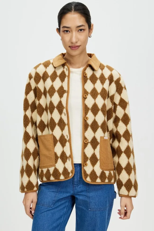 A model wearing the Brixton Wylie sherpa fleece jacket in white and brown.
