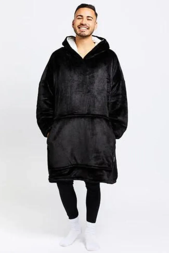 Model wearing a black oodie jumper.