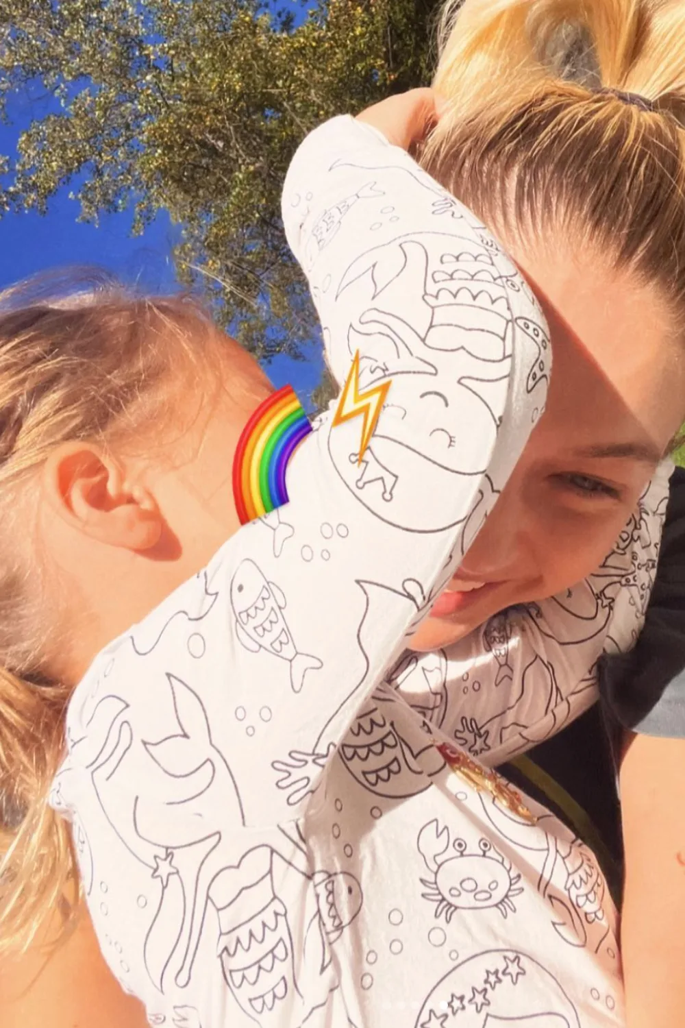 Gigi Hadid hugging her daughter Khai. 