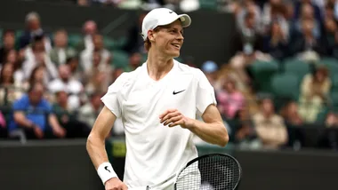 Jannik Sinner of Italy celebrates a point against Ben Shelton of United States in his Gentleman's Singles fourth round match during day seven of The Championships Wimbledon 2024 at All England Lawn Tennis and Croquet Club on July 07, 2024 in London, England.