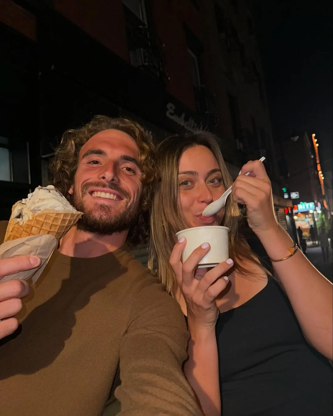 Stefanos Tsitsipas and girlfriend Paula Badosa eating ice cream
