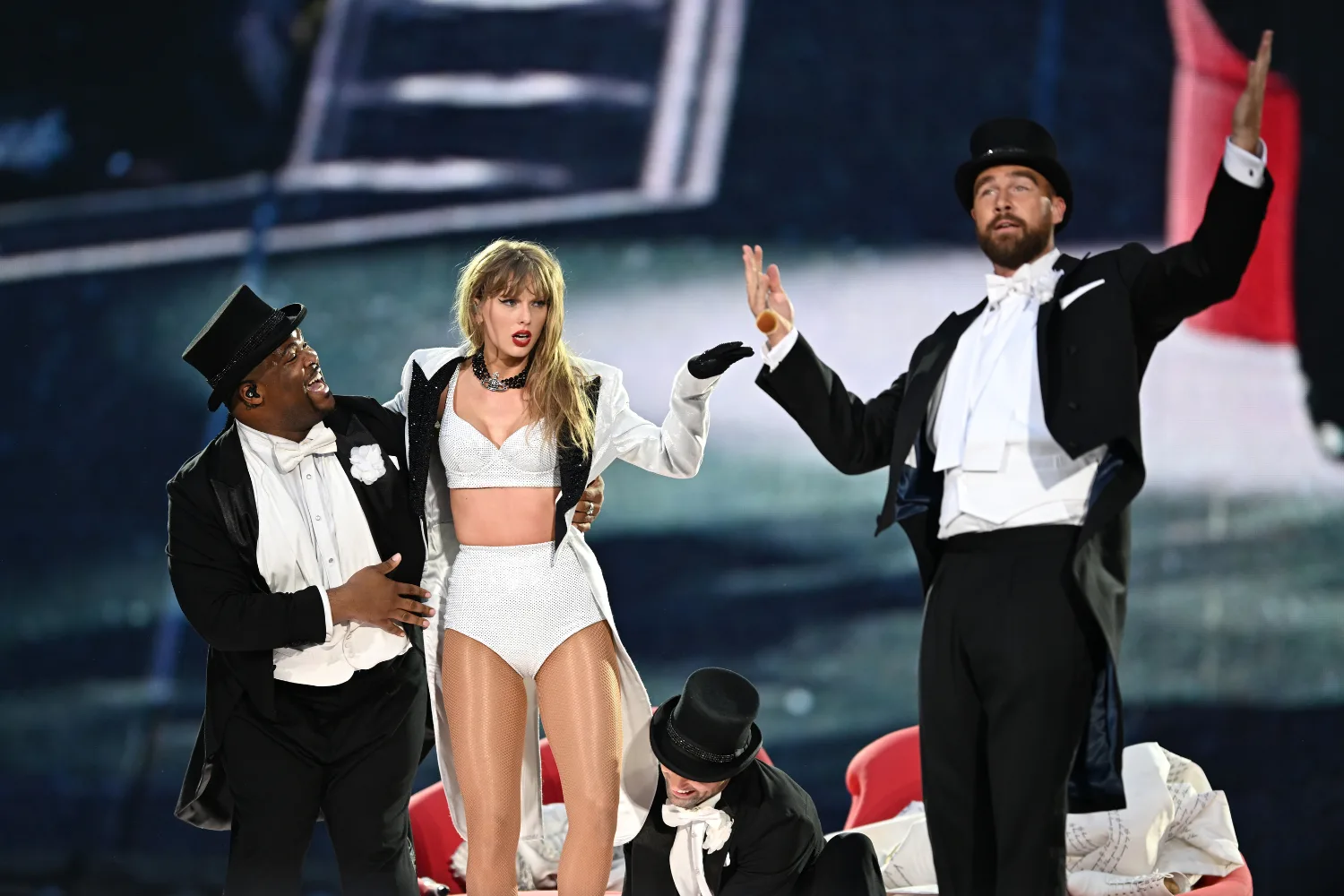 Taylor Swift and Travis Kelce on stage at The Eras Tour in London.