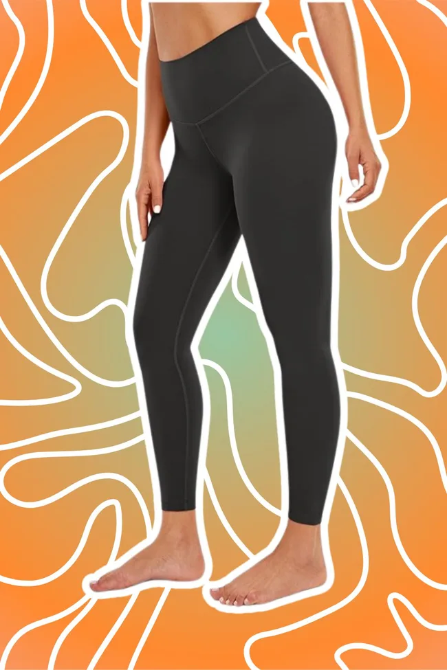 Person wearing black leggings on an abstract orange and green background.