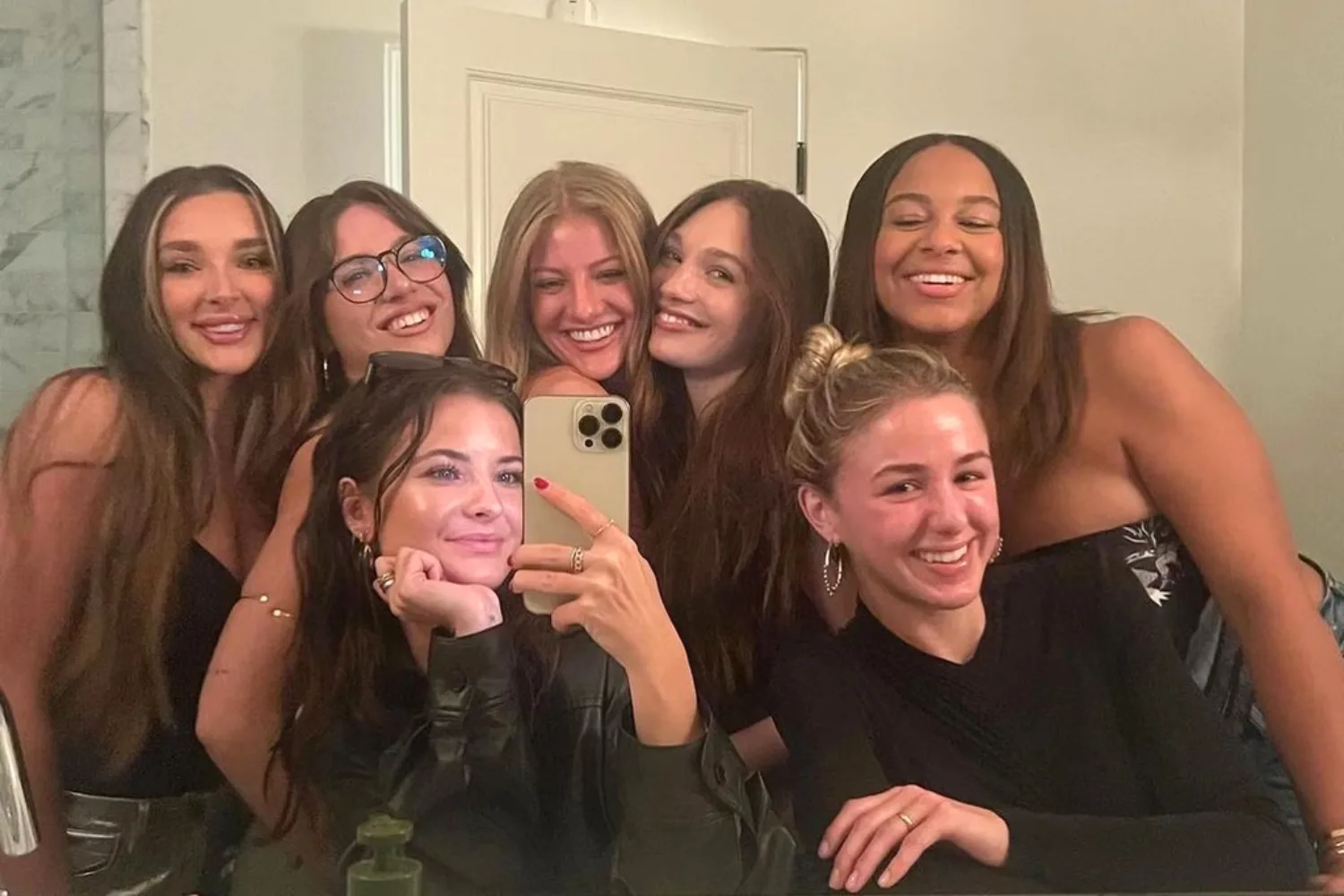 Original cast of Dance Moms taking a mirror selfie.