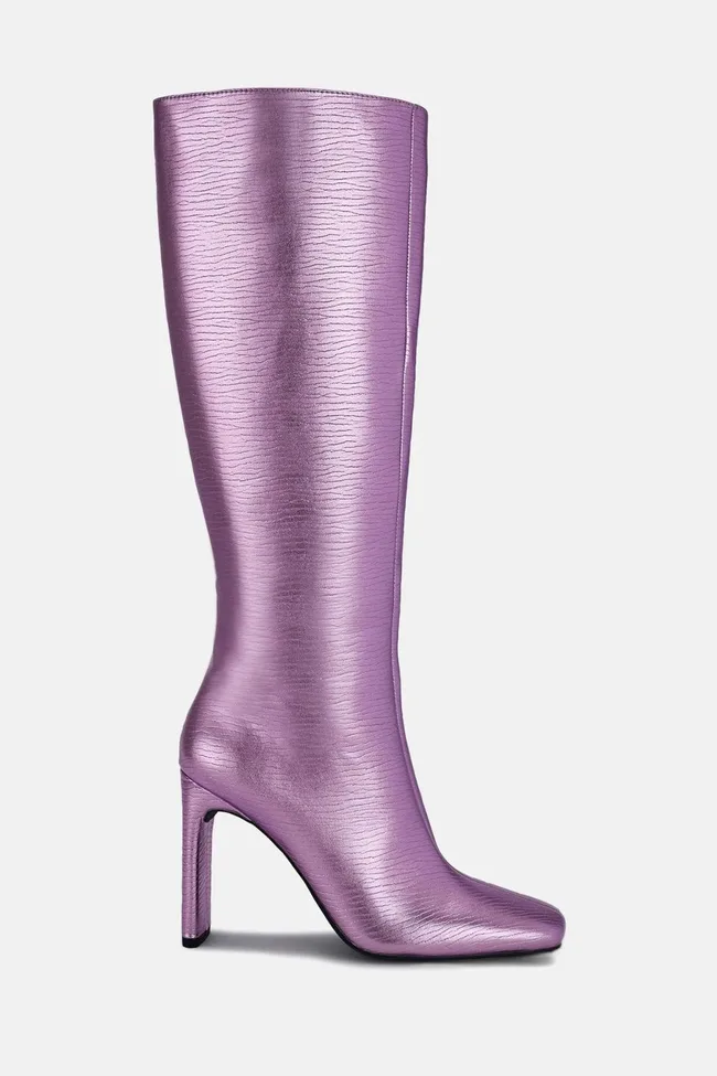 Purple high-heeled knee-high boot on white background.