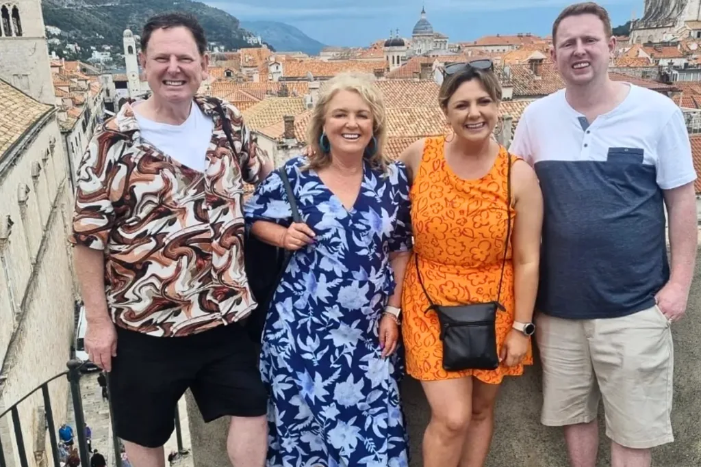 The Fren Family standing at a lookout in Croatia. 