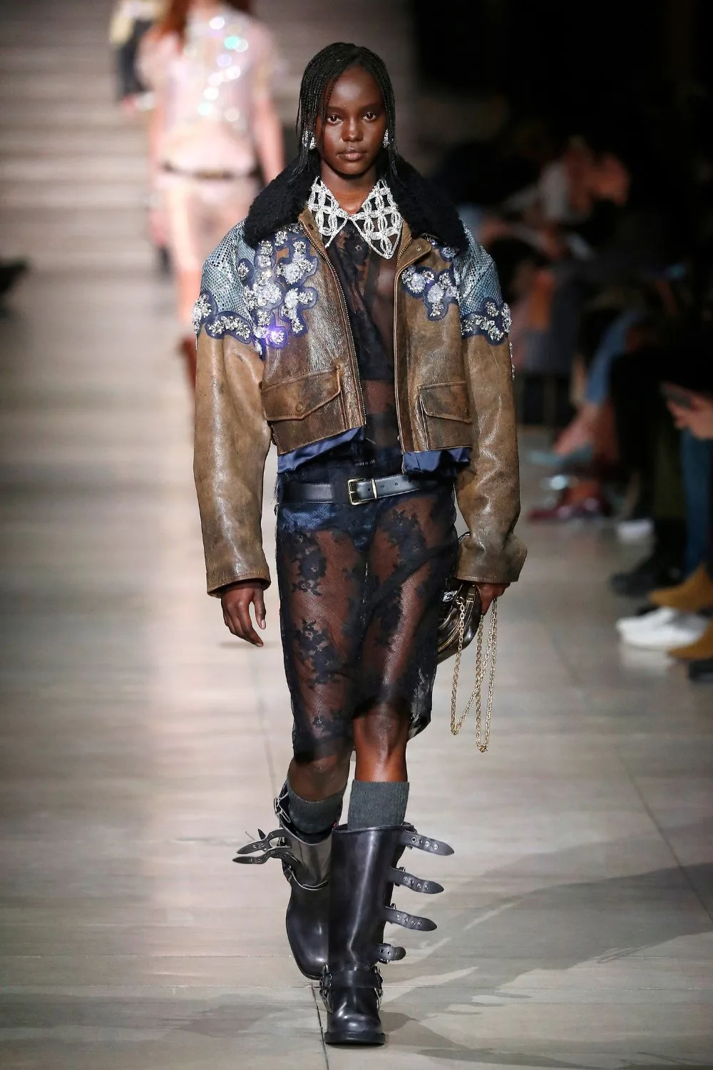 Miu Miu Fall Winter 2023 runway collection- model wearing boots