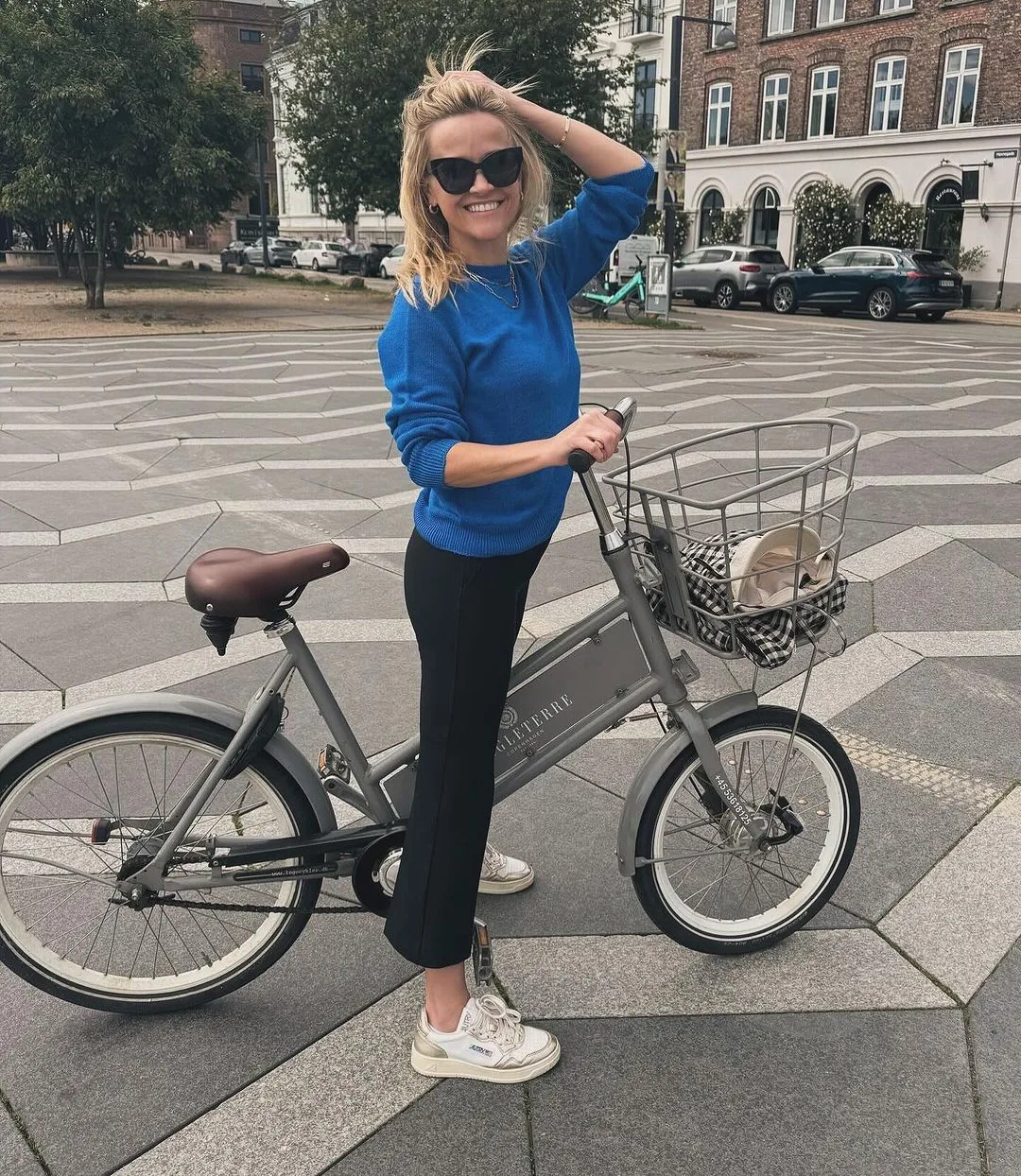 Reese Witherspoon riding a bike