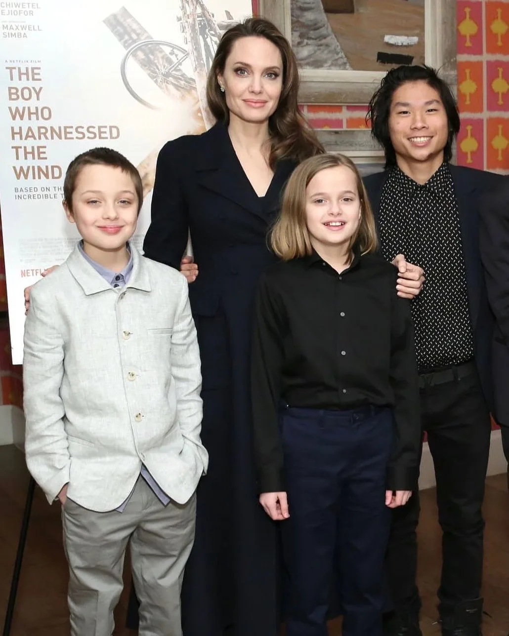 Angelina Jolie with Pax at far right.