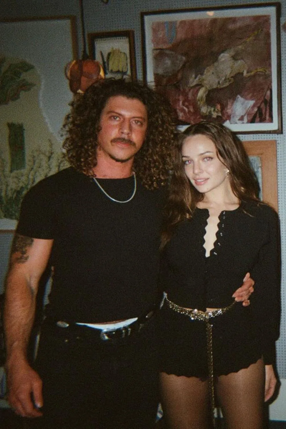 Abbie Chatfield and Adam Hyde posing for a photo
