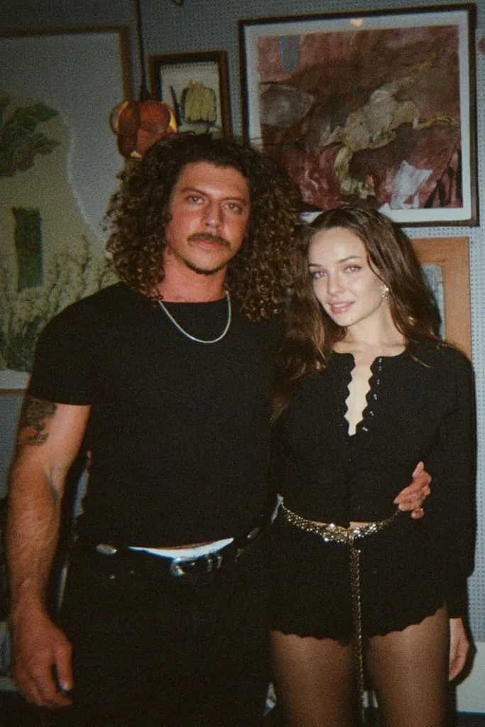 Abbie Chatfield and Adam Hyde posing for a photo