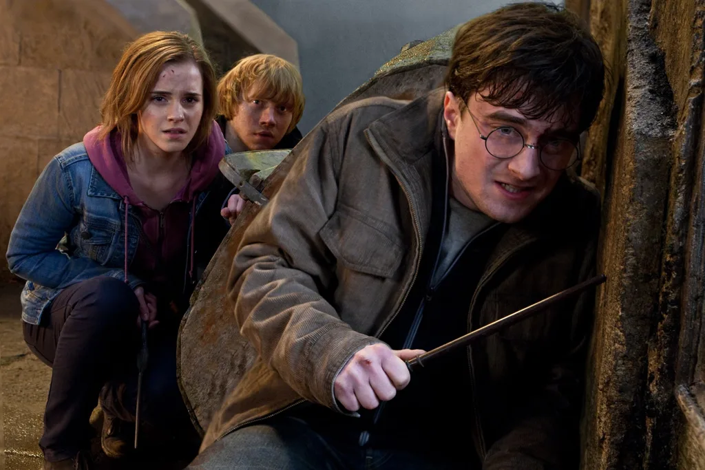 Emma with co stars Daniel Radcliffe and Rupert Grint in Harry Potter
