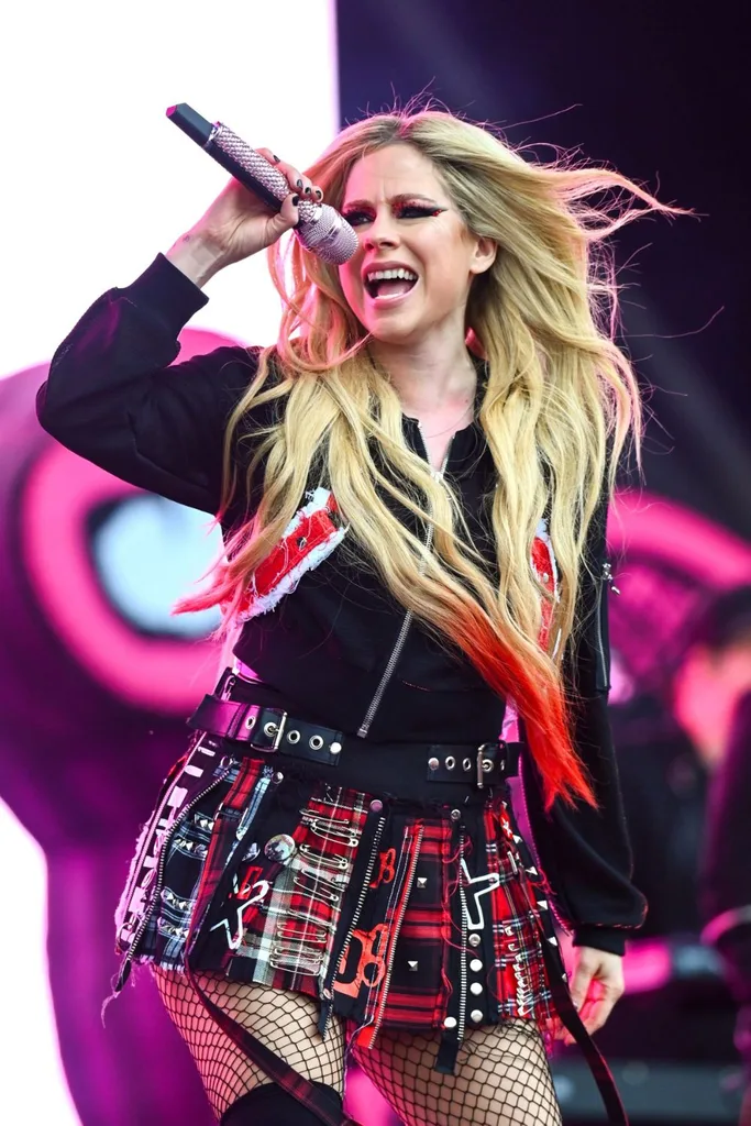 Avril Lavigne performing at Glastonbury.