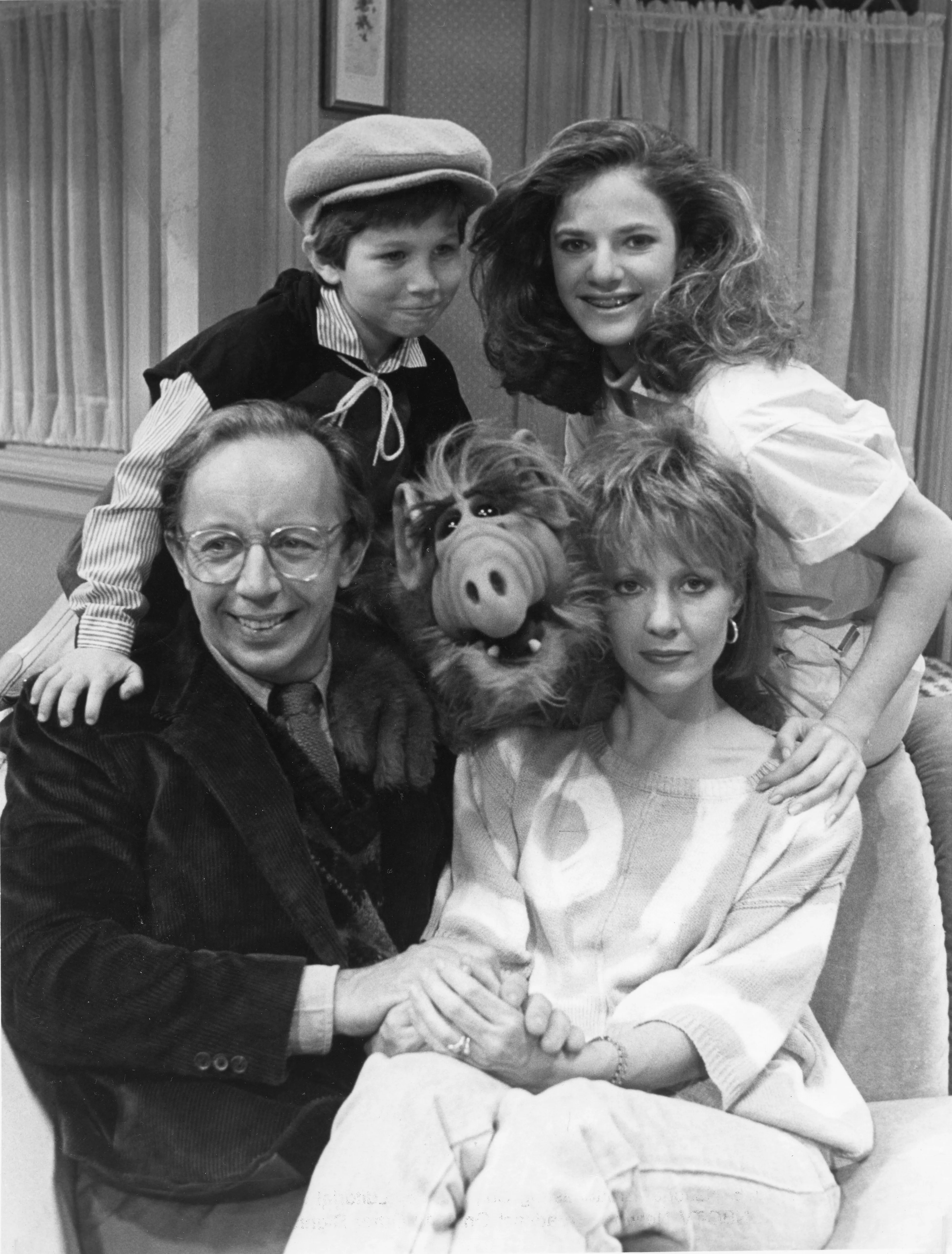 (L-R) Max Wright, Benji Gregory, Andrea Elson, and Anne Shedeen with ALF aka Alien Life Form in still from the TV show "ALF" on May 23, 1986 in Los Angeles, California. (Photo by Michael Ochs Archives/Getty Images)