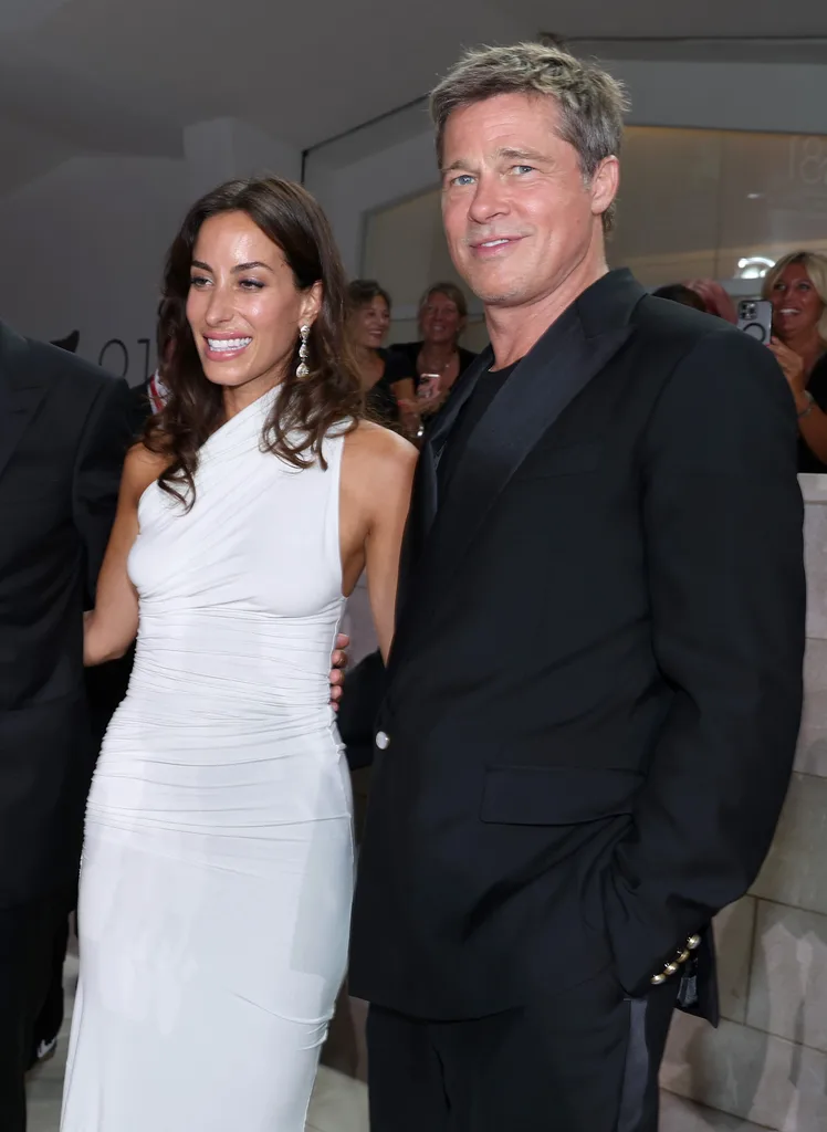 VENICE, ITALY - SEPTEMBER 01: Ines de Ramon and Brad Pitt attend the "Wolfs" red carpet during the 81st Venice International Film Festival on September 01, 2024 in Venice, Italy. (Photo by Pascal Le Segretain/Getty Images)