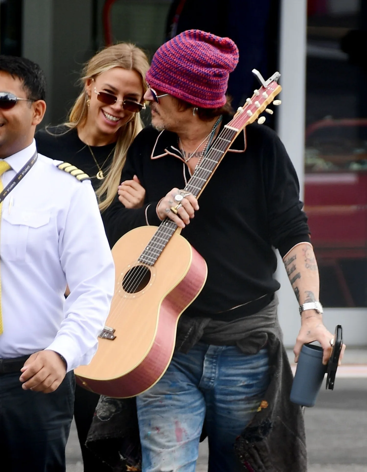 Yulia Vlasova and Johnny Depp looking cosy