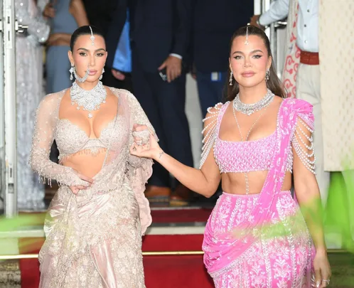 Kim and Khloe Kardashian in Mumbai at Anant Ambani and Radhika Merchant's wedding.