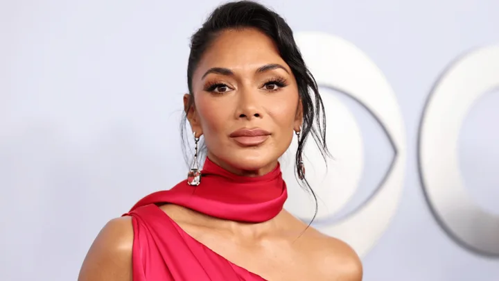 Nicole Scherzinger in red dress on red carpet