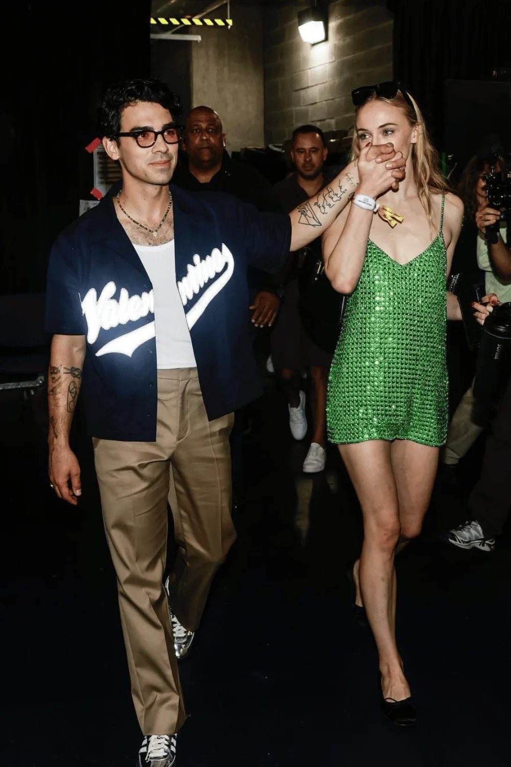 Sophie Turner kisses Joe Jonas' hand.