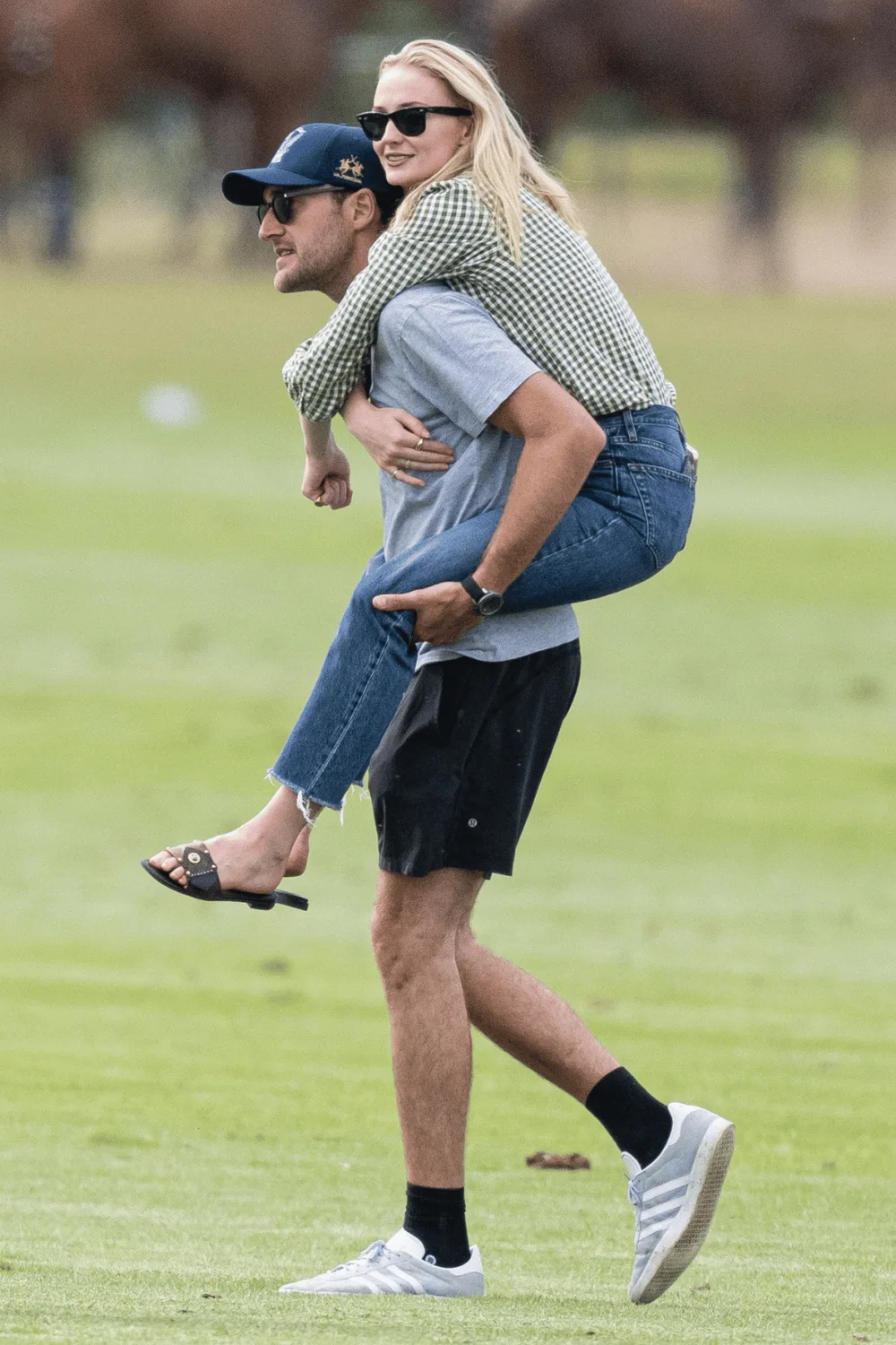 Sophie Turner on Peregrine Pearson's back during outing