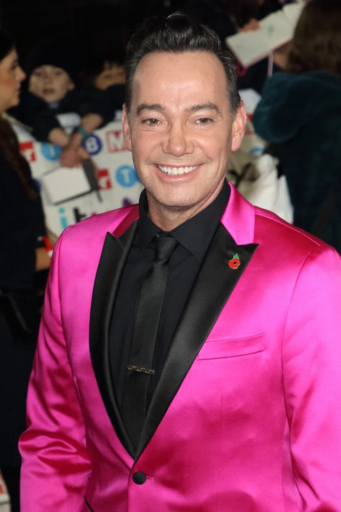 Craig Revel Horwwood wearing a pink blazer.