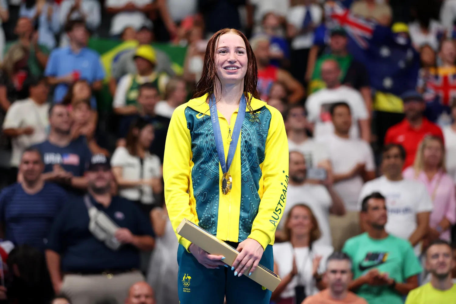 Australian swimmer Mollie O'Callaghan with her Paris 2024 Olympic gold medal.