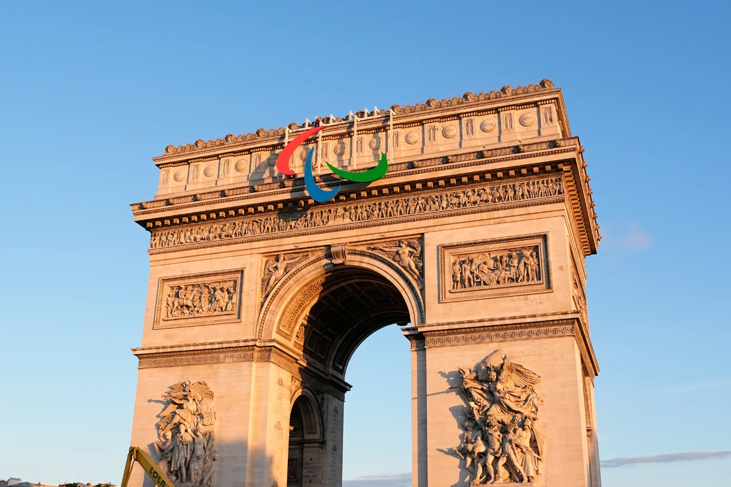 Paralympic symbol over Arc du Triomphe