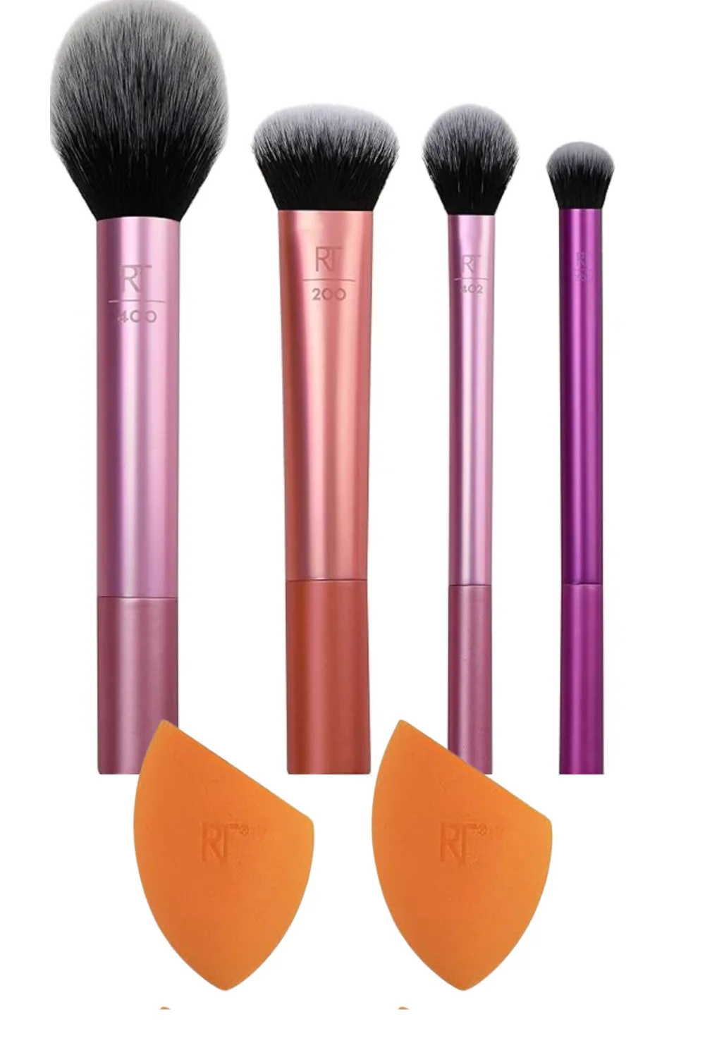 Four pink Real Techniques makeup brushes and two orange makeup sponges.