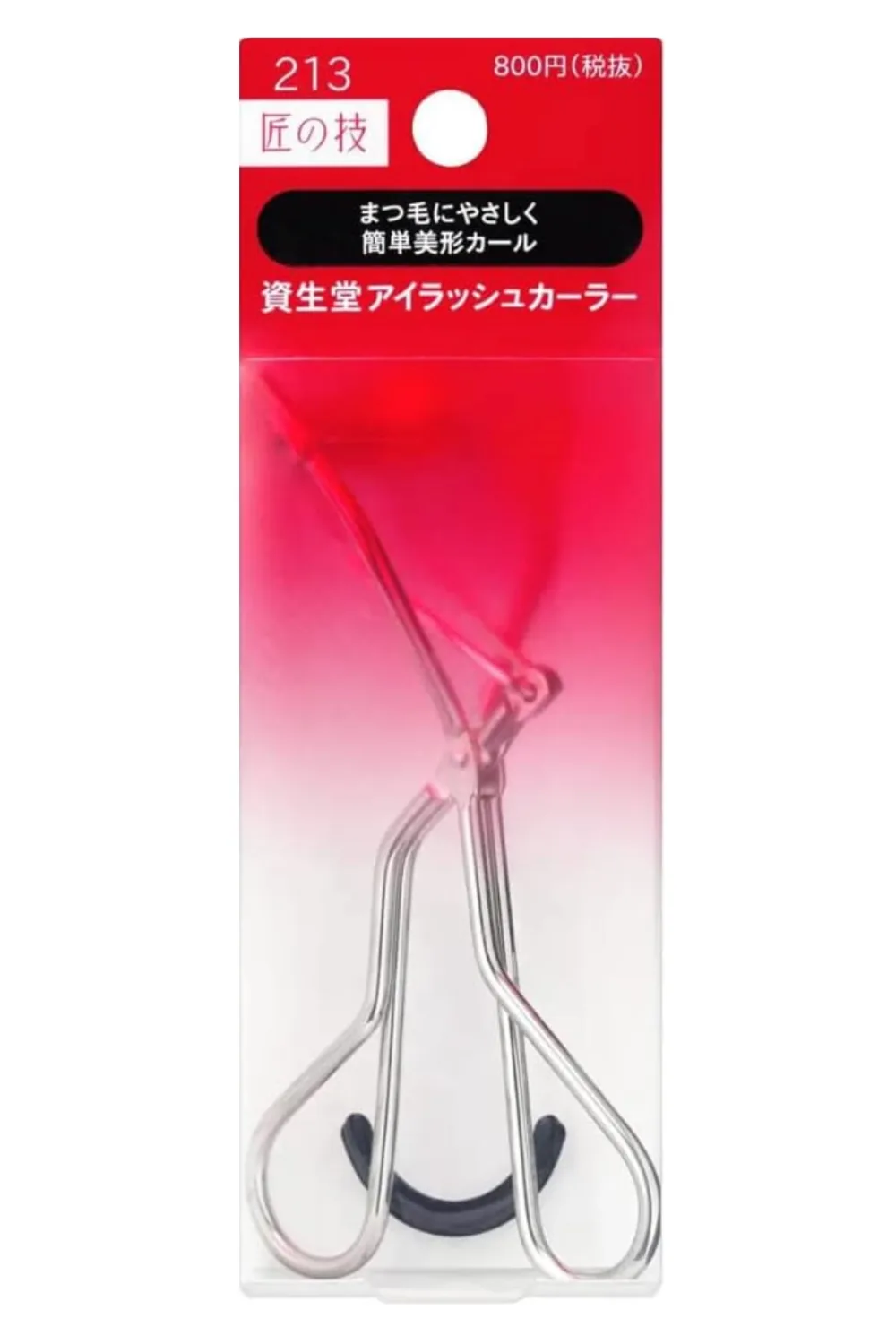 Shiseido eyelash curler in red packaging.