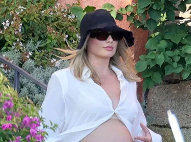 Pregnant Margot Robbie glows in holiday pics as new family details emerge