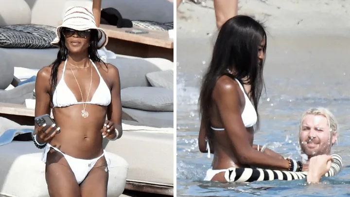 Naomi Campbell in a white bikini on a Mykonos beach with DJ Rampa