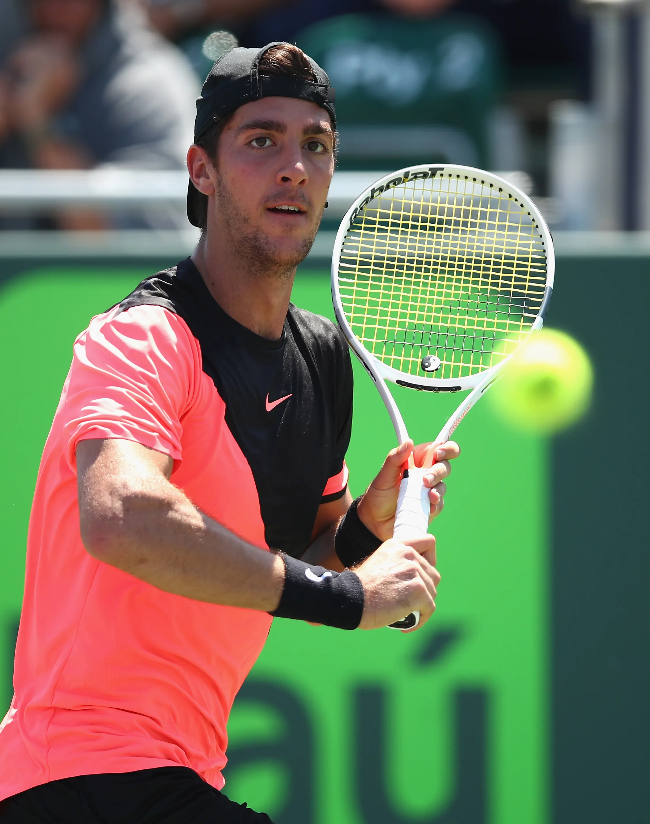 KEY BISCAYNE, FL - MARCH 26: Thanasi Kokkinakis of Australia plays a backhand against Fernando Verdasco of Spain in their third round match during the Miami Open Presented by Itau at Crandon Park Tennis Center on March 26, 2018 in Key Biscayne, Florida. (Photo by Clive Brunskill/Getty Images)