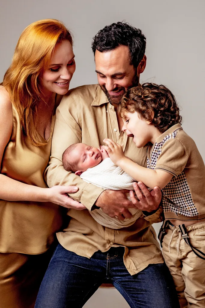 Jules Robinson, Cam Merchant and their two sons Ollie and Carter