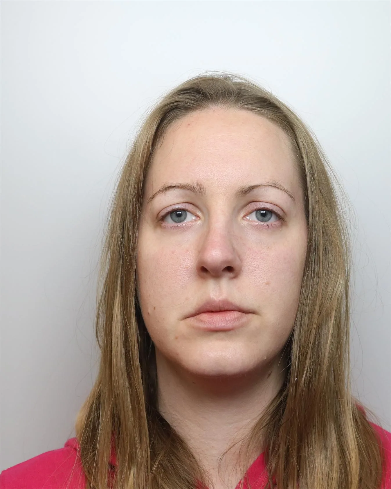 CHESHIRE, ENGLAND - NOVEMBER 2020: In this handout photo provided by Cheshire Constabulary, Lucy Letby has a headshot taken while in police custody in November 2020. Letby, a former nurse at Countess of Cheshire Hospital, was convicted of murdering seven babies, and attempting to murder six more, in the hospital’s neonatal ward between 2015 and 2016. (Handout Photo by Cheshire Constabulary via Getty Images)