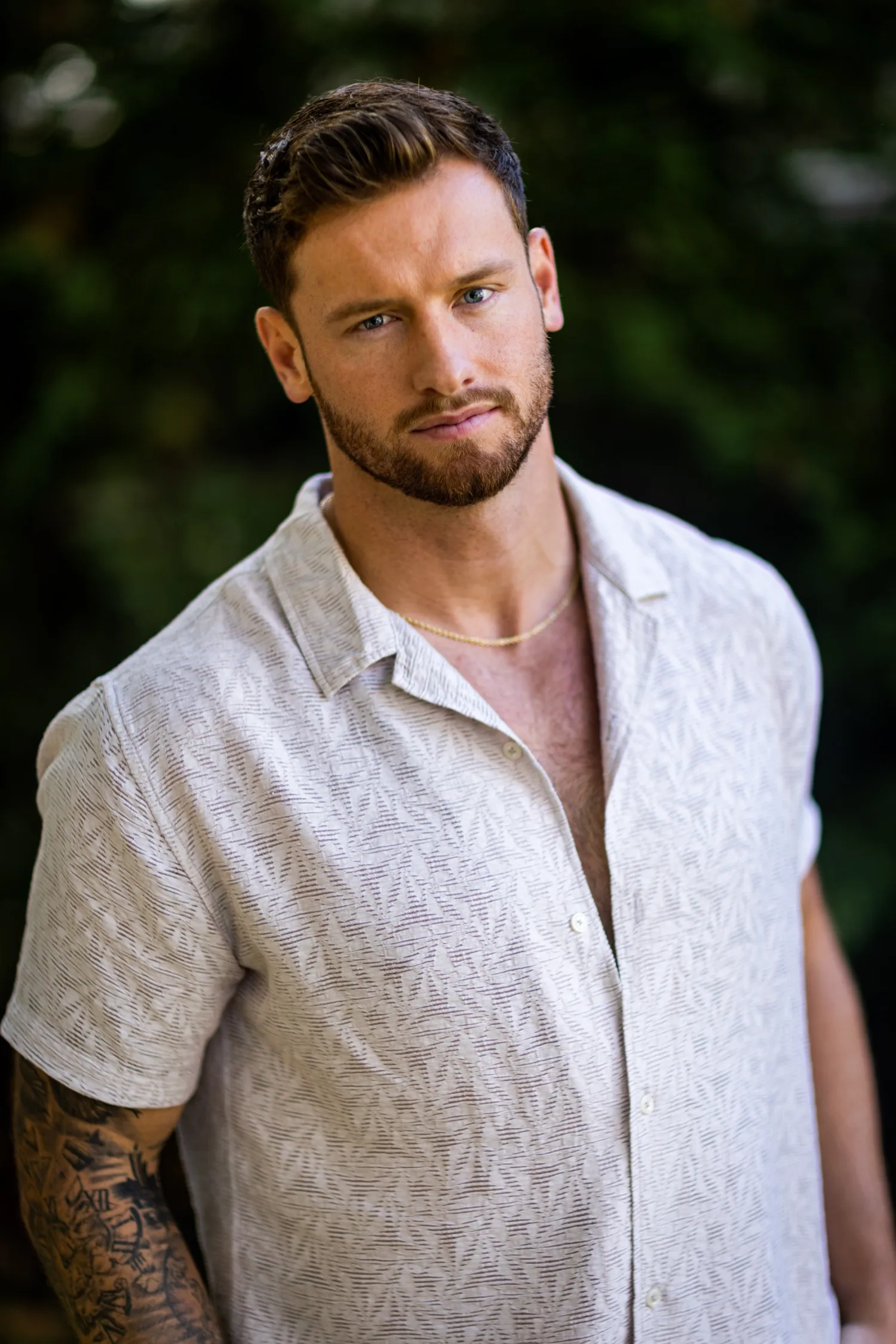 Lachy McLean from Made In Bondi poses in white shirt