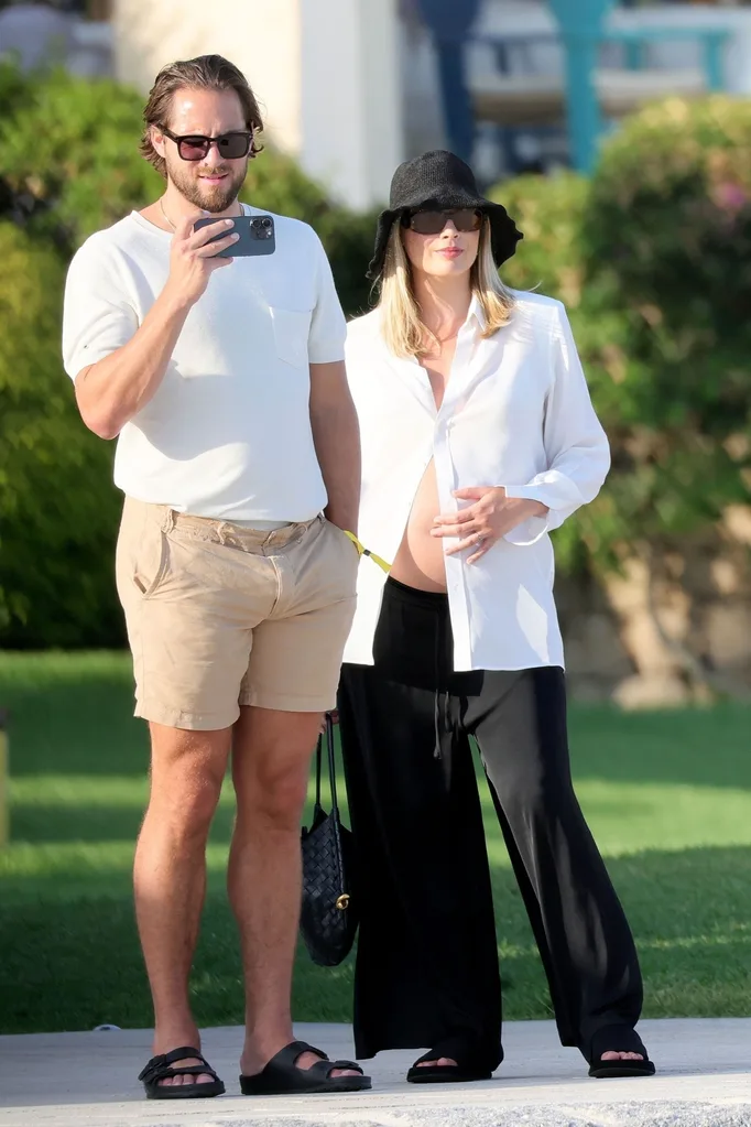 Pregnant Margot Robbie and Tom Ackerley
