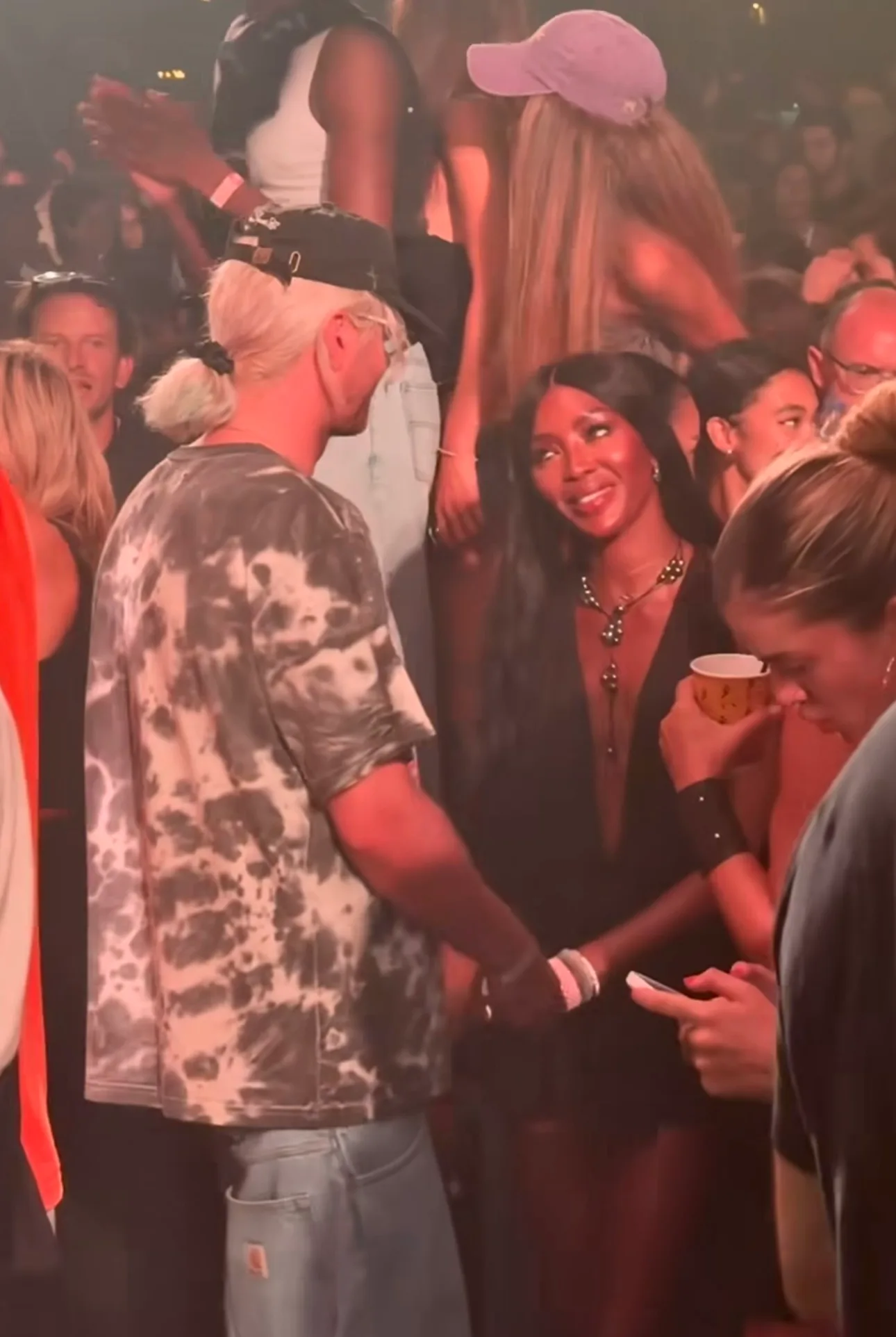 Naomi Campbell gazes at DJ Rampa in a nightclub in Istanbul.