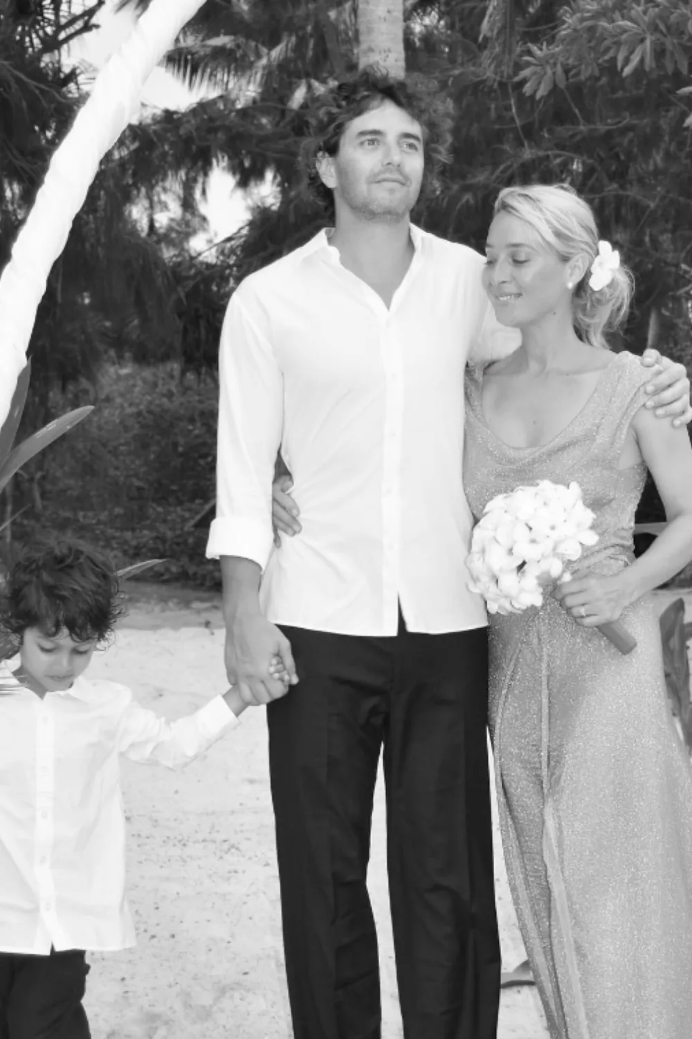 A black and white photo of Asher Keddie and Vincent Fantauzzo's beach wedding.