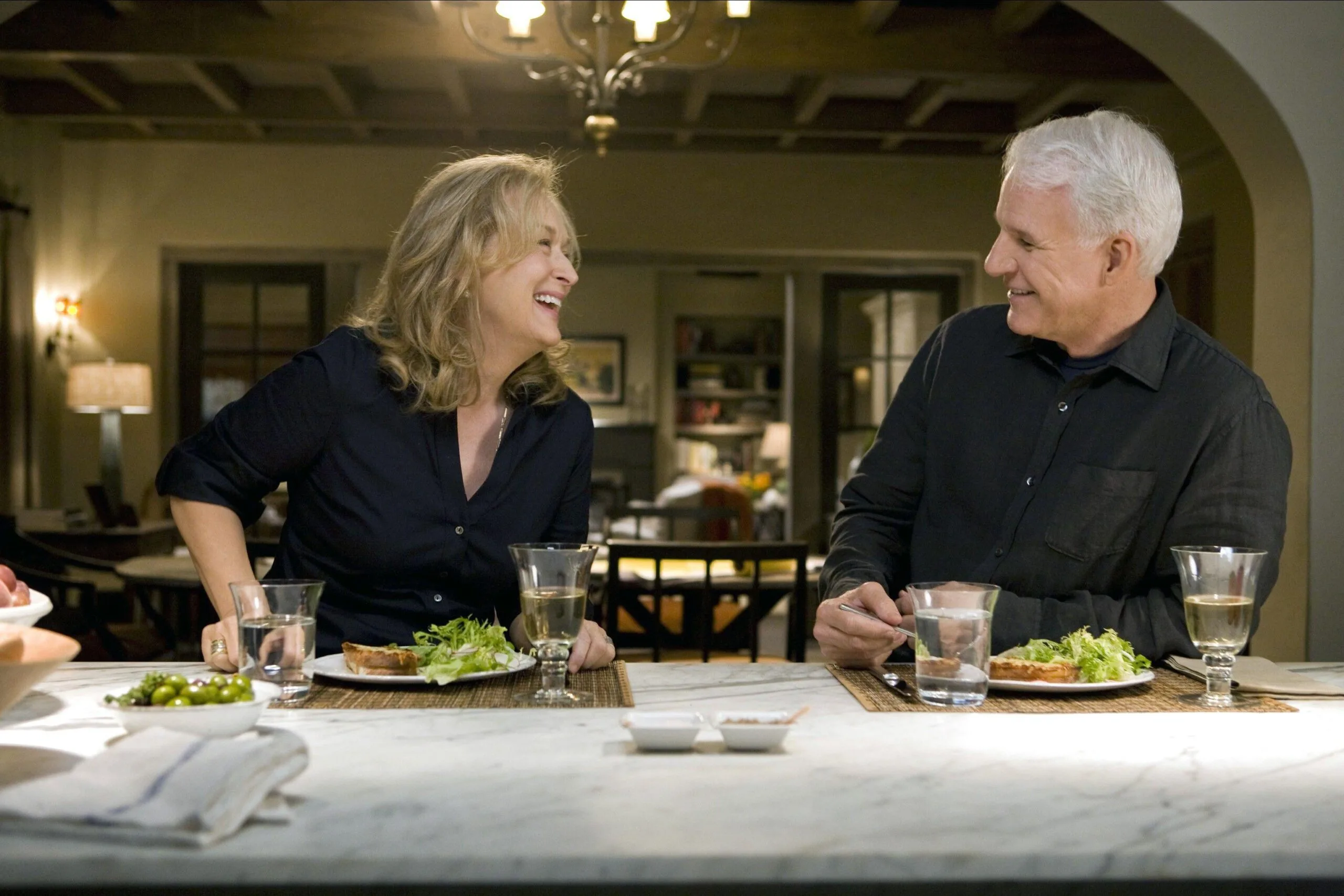 Meryl Streep and Steve Martin sharing a meal together in It's Complicated 